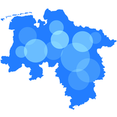 Auf einer blauen Niedersachsen-Karte sind verschieden große Kreise zu sehen, welche die Wahlkreise symbolisieren sollen.