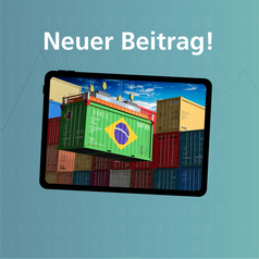 Auf dem Bildschirm sind Container – einer davon mit der brasilianischen Flagge – zu sehen.